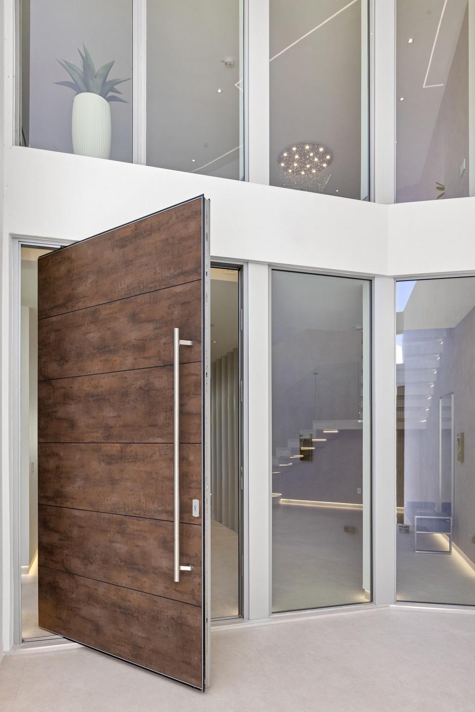 Villa Golden pivot front door and double-height entry, Golden Isles, Hallandale Beach luxury rental