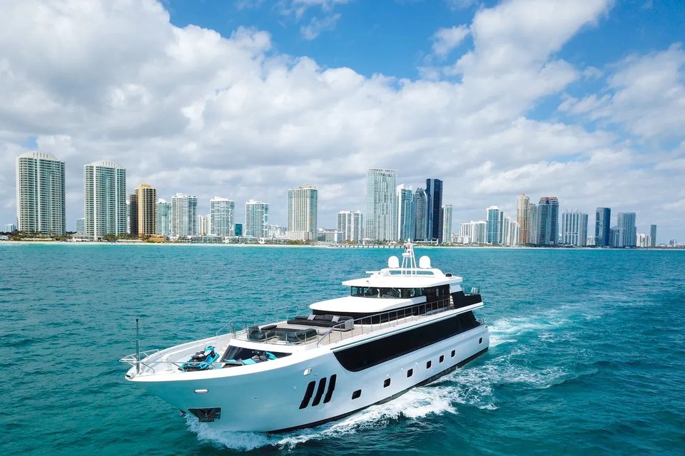 The 112 foot WHS Marine cruising past the Miami skyline