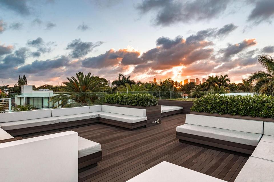 Rooftop terrace with plunge pool at sunset, Villa Lavoro, Miami Beach luxury rental