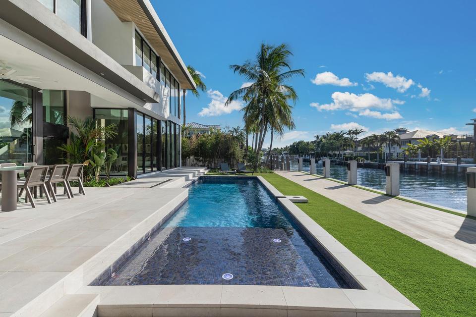 Lap pool running along the canal, Villa Sia, Las Olas Isles, Fort Lauderdale luxury rental