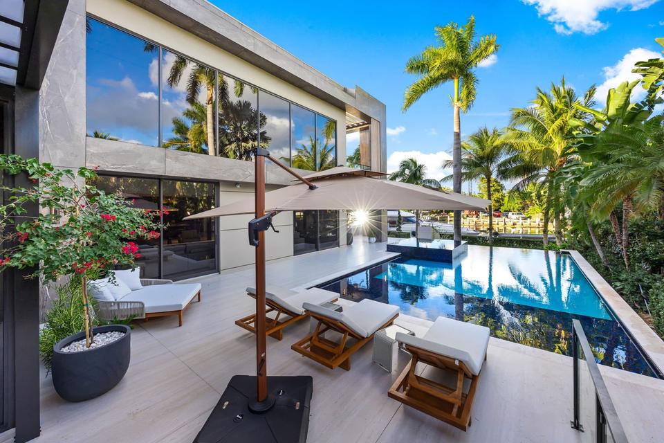 Villa Alpha pool terrace and loungers