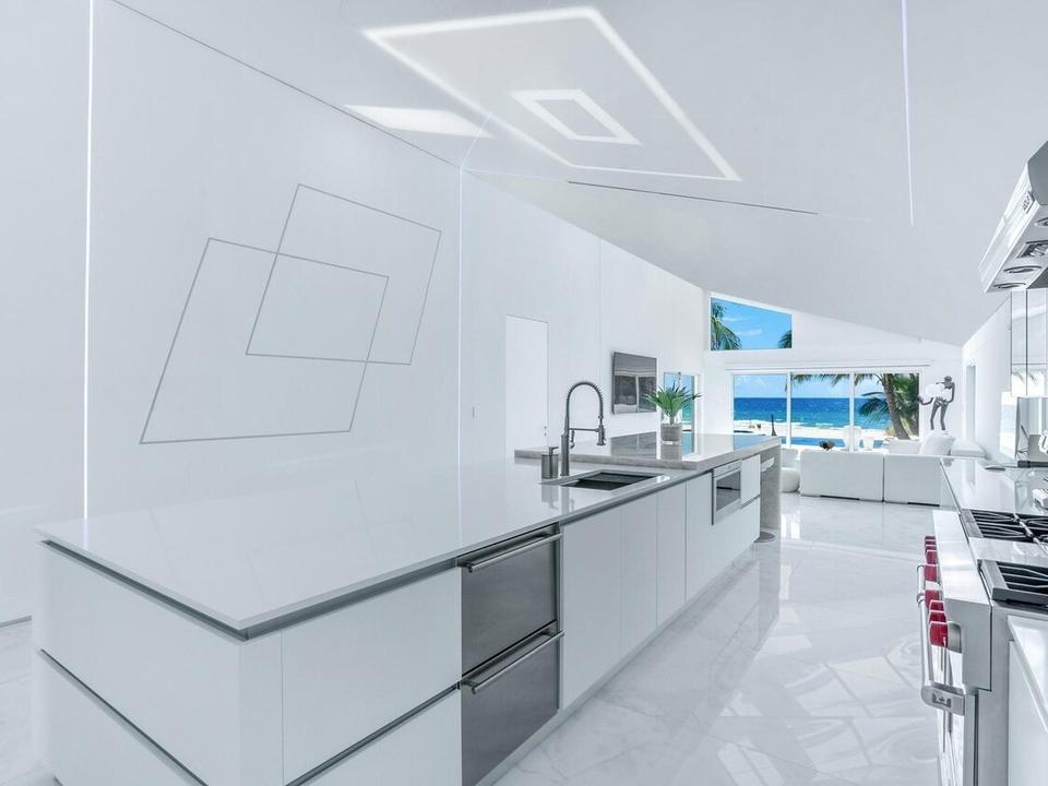 White kitchen with lit ceiling panels, Beach Bungalow, Miami