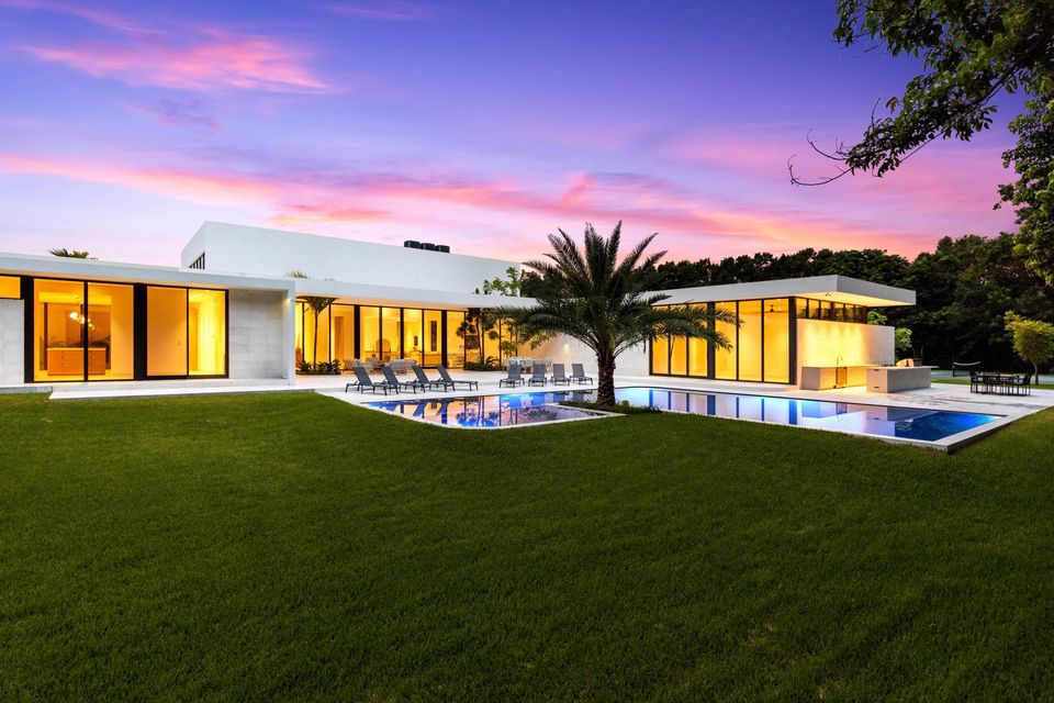Villa Verano at dusk, lawn, palm and lit pool terrace, Villa Verano, Southwest Ranches
