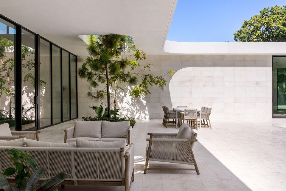 Covered patio with lounge seating and outdoor dining, Villa Verano, Southwest Ranches