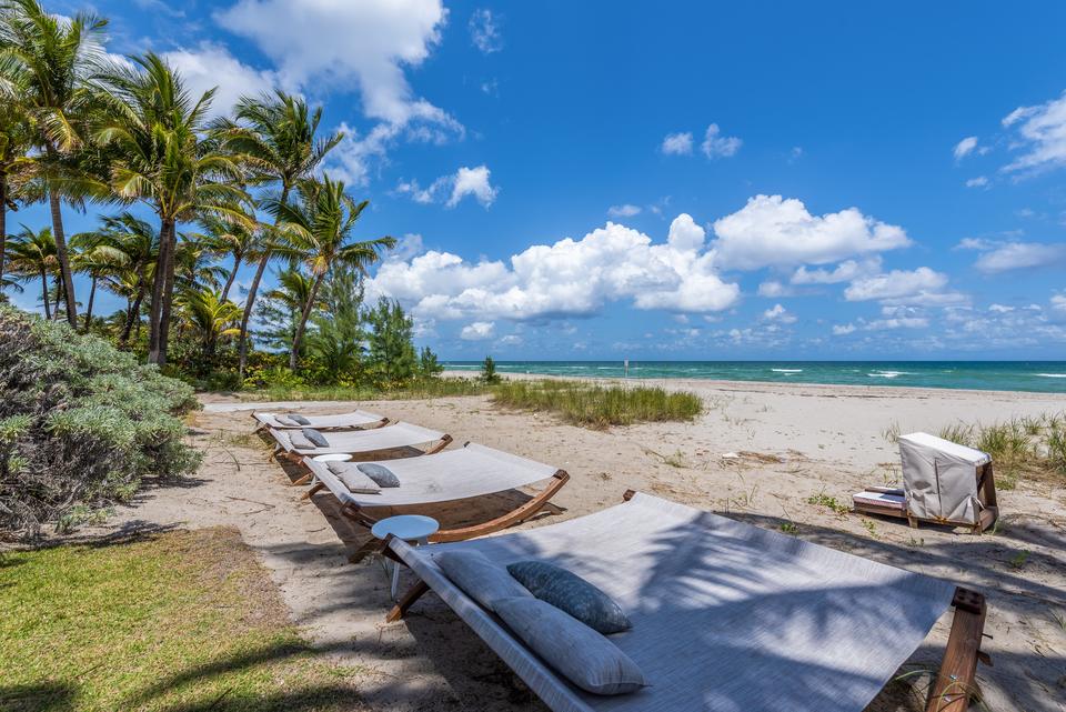 Beach loungers on the private sand, Villa Ocean, Miami