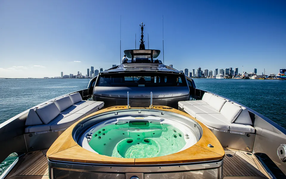 Bow hot tub on the Pershing 116 yacht with the downtown Miami skyline ahead