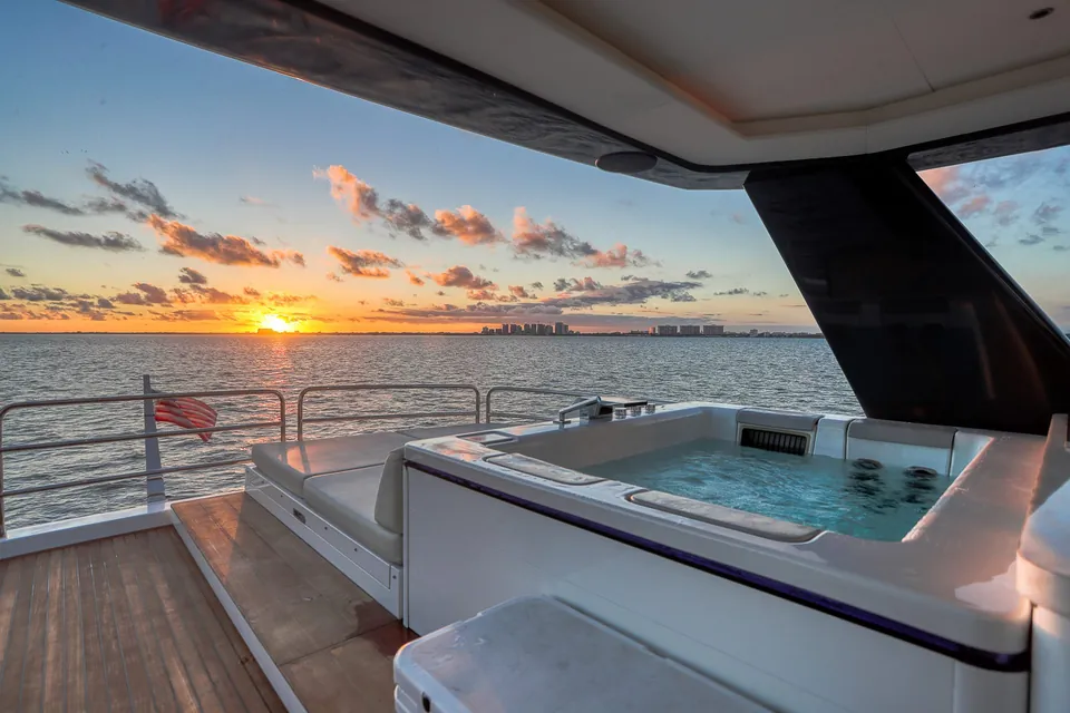 Sunset over Biscayne Bay seen from the deck of the Sirena 88 yacht