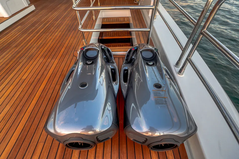Two underwater sea scooters ready on the teak swim platform of a yacht in Miami