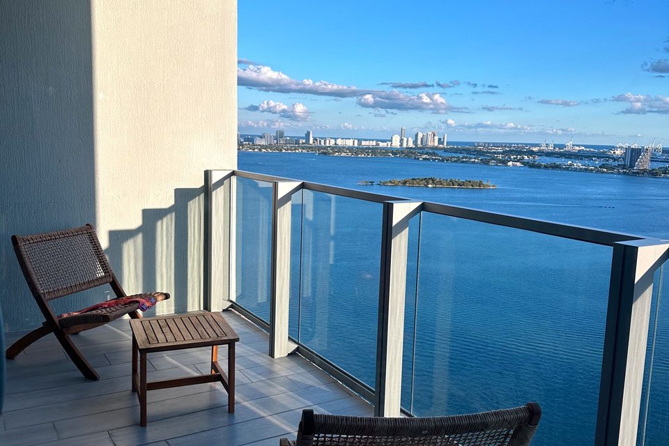 Balcony of a high-rise Miami apartment overlooking Biscayne Bay