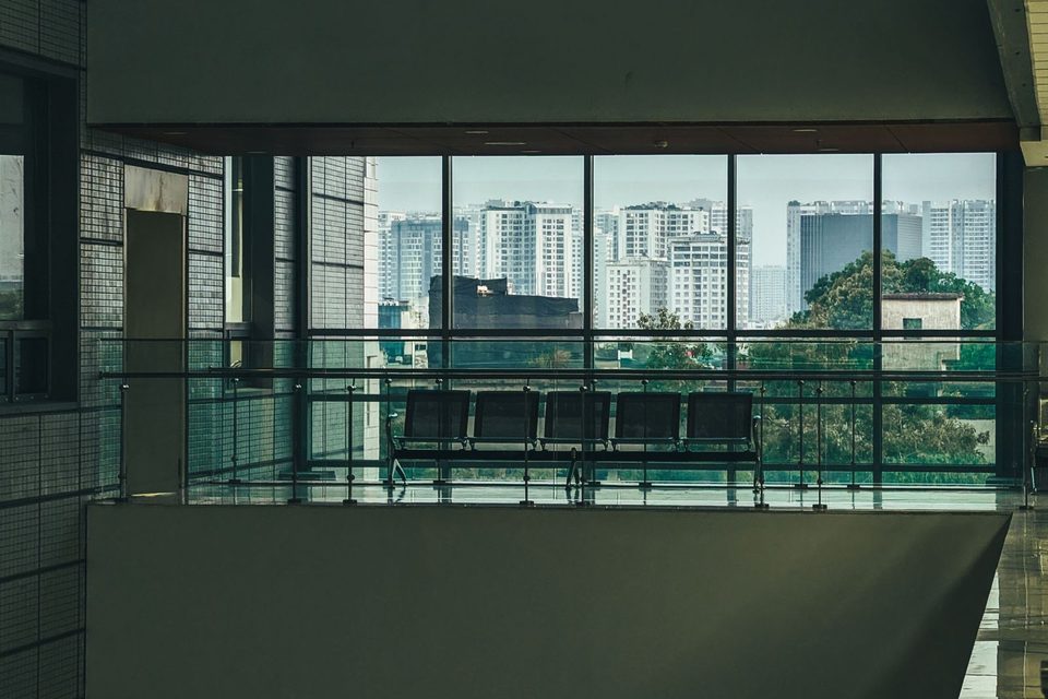 Glass-walled office looking out to Miami towers