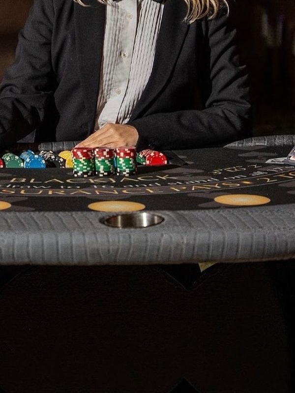 Casino table with stacked chips at a private event