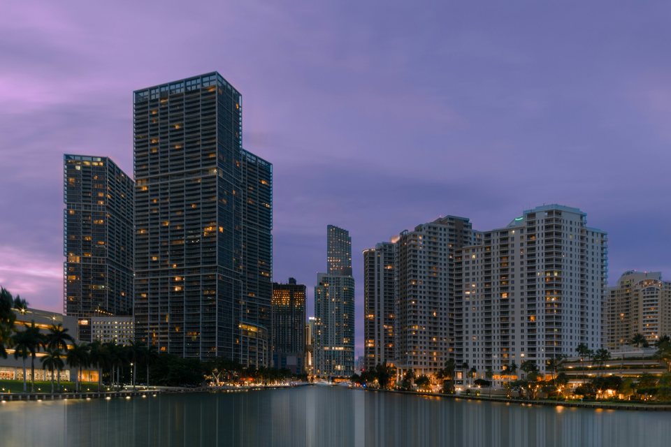 Brickell Key towers over Biscayne Bay at dusk, Miami