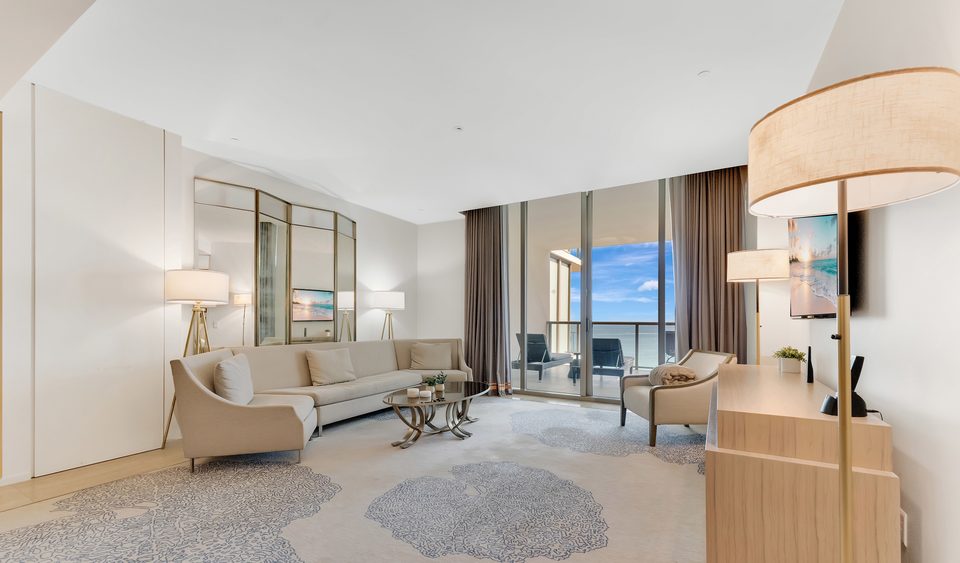 Living room of a St. Regis Bal Harbour suite with ocean views