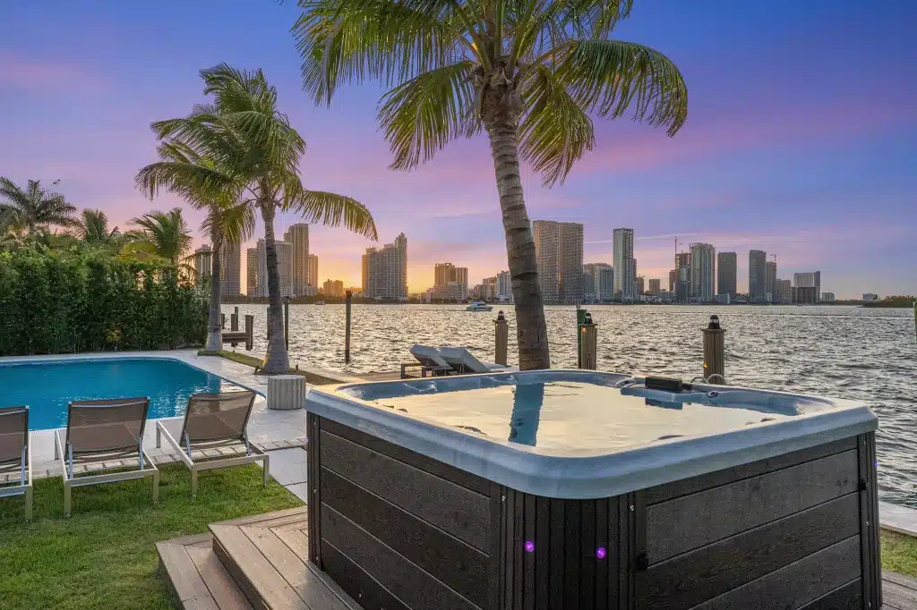 Jacuzzi and pool on the bay at sunset, Villa Venetian, Venetian Islands, Miami Beach
