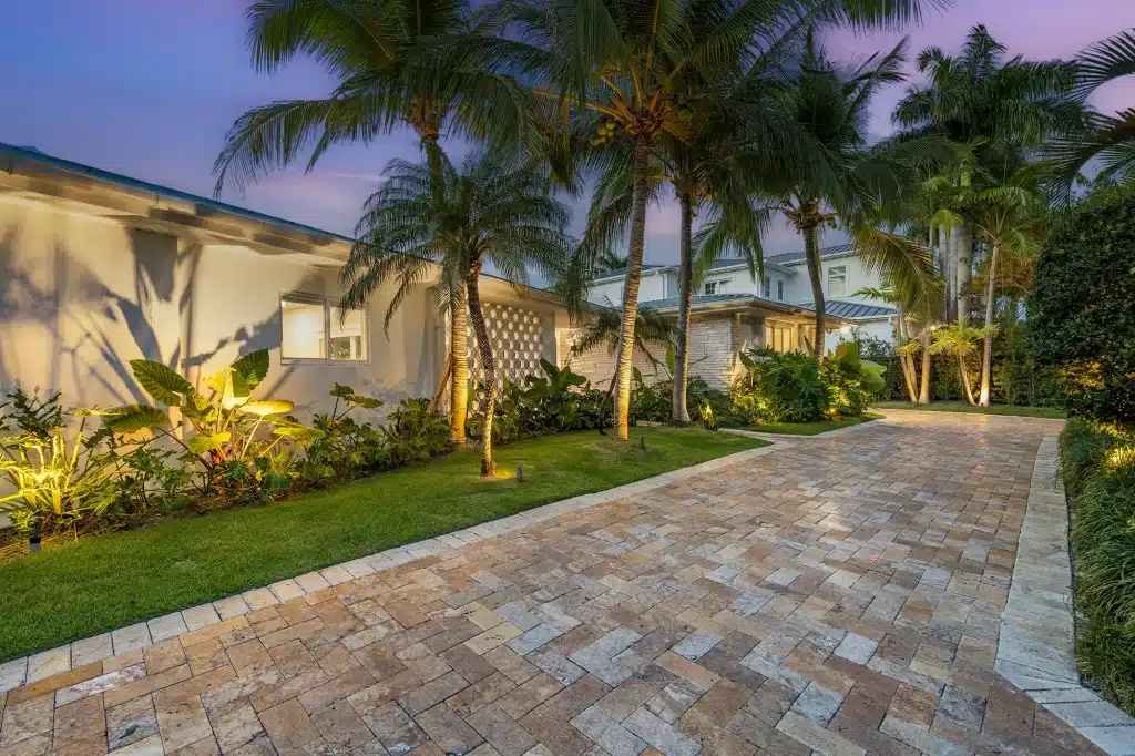 Palm-lined driveway lit at dusk, Villa Venetian, Venetian Islands, Miami Beach