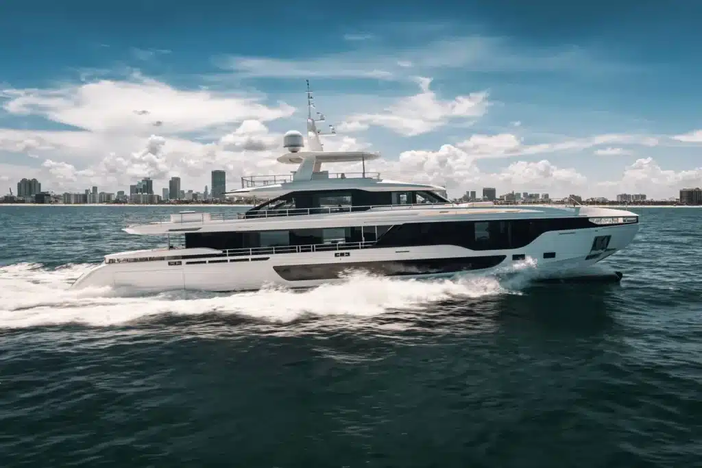 The 118 foot Azimut yacht cruising on Biscayne Bay past the Miami skyline