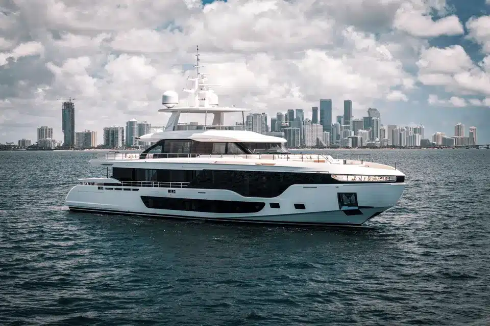 Azimut 118 yacht on Biscayne Bay with the Miami skyline behind.