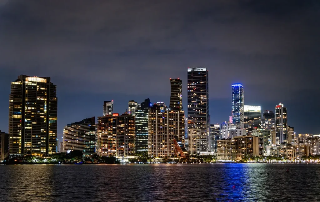 Brickell and Downtown Miami skyline at night over Biscayne Bay