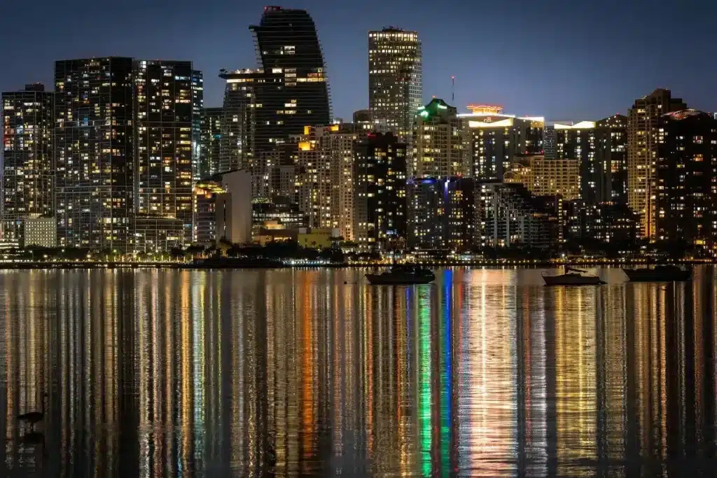 Brickell skyline reflected in Biscayne Bay at night