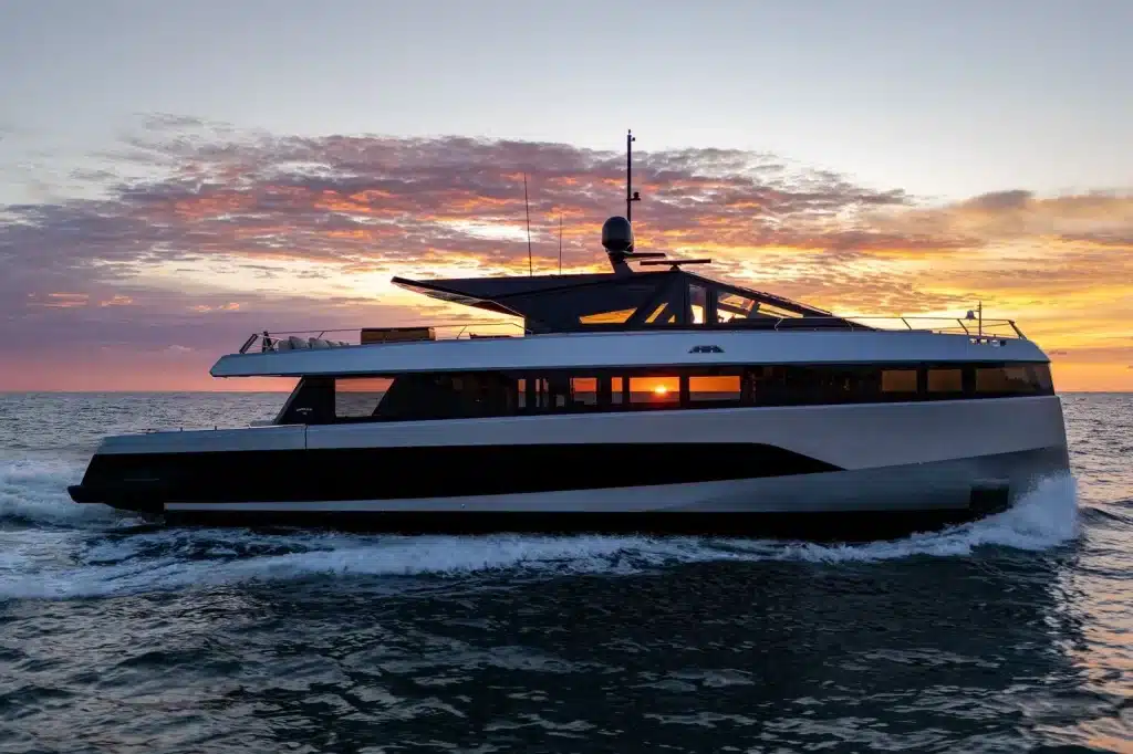 Luxury yacht cruising at sunset off Miami, ready for a private marriage proposal