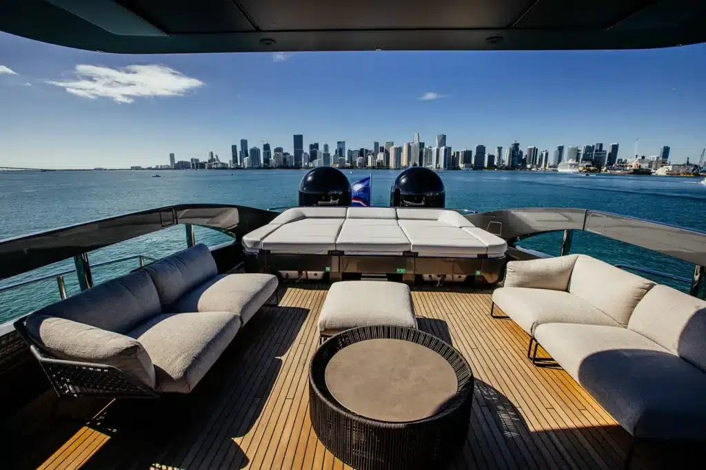 Lounge deck of the 116 foot Pershing GTX yacht facing the Miami skyline