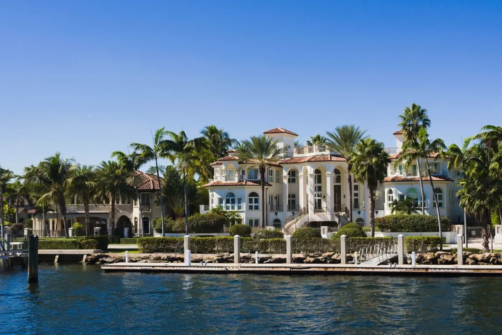 Waterfront homes with palm trees and private docks in South Florida